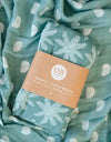 Bamboo + Cotton Ocean Palms Swaddle